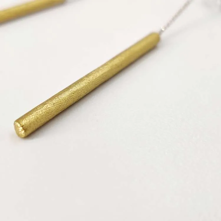 Orecchini pendenti Tubini in alluminio dorato