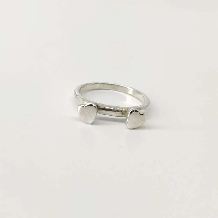 Anello a fedina Cuoricini in argento