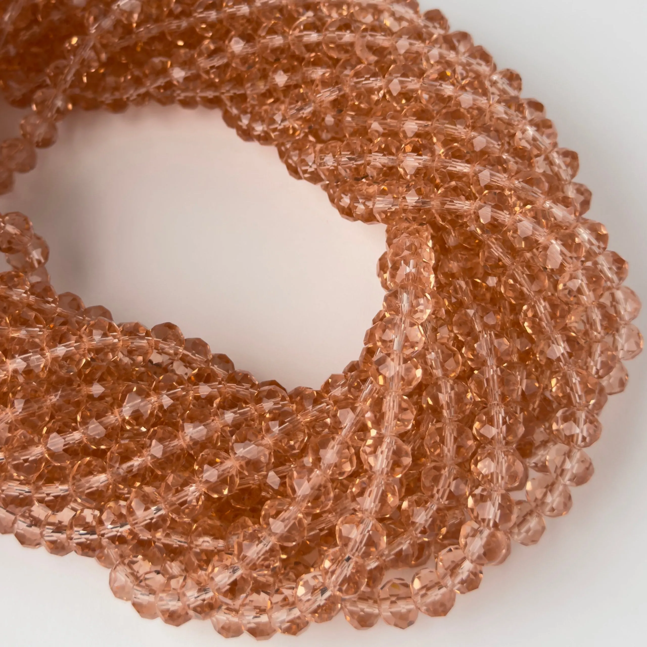 Antikrosa klare Rondella-Kristalle 8 x 6 mm – 10 Stränge | Sarobidi