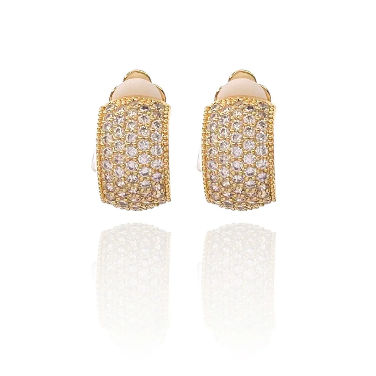 Orecchini a clips modello Curved in ottone dorato- rodiato