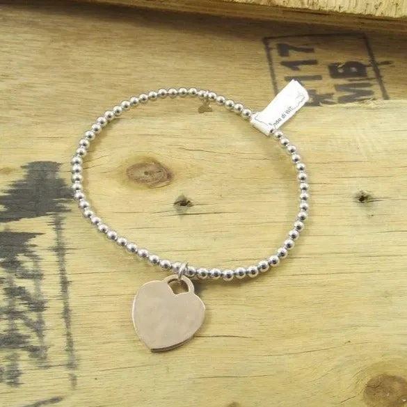 SILBERARMBAND mit Kugeln und HERZ