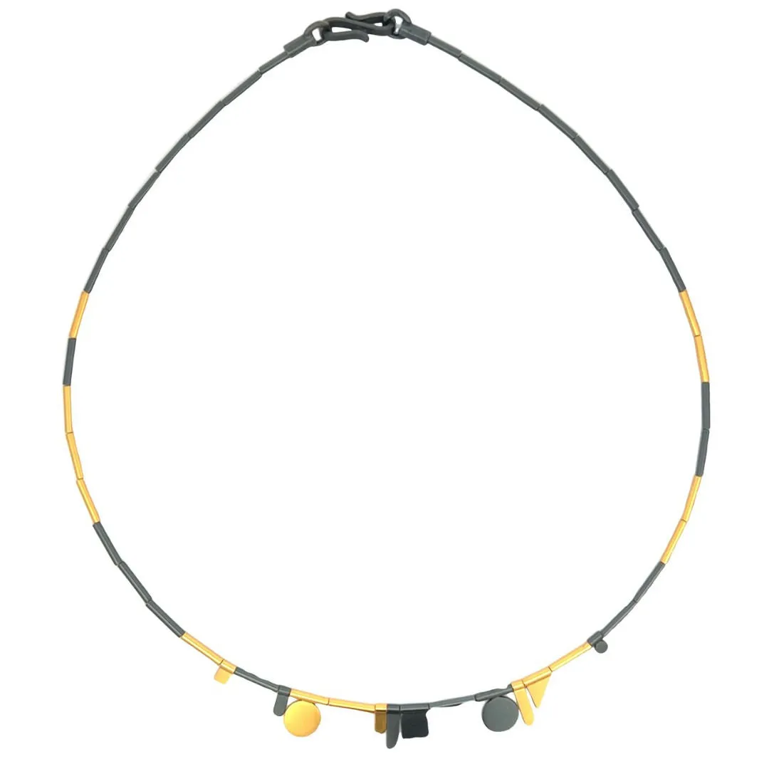 Collana in argento annerito e argento placcato oro