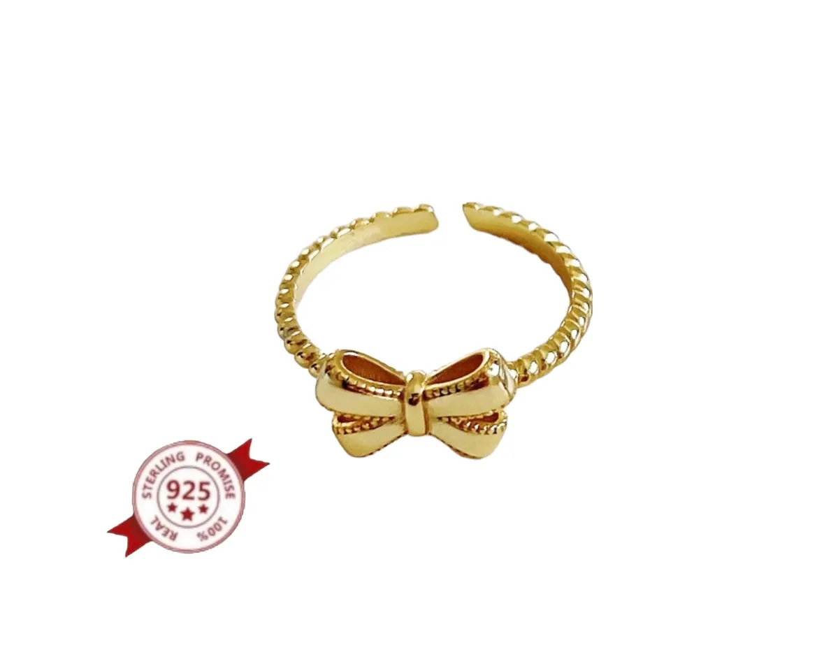 Anello regolabile fiocco argento 925