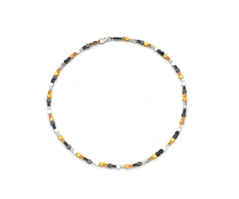 Bracciale in argento, argento placcato oro e annerito