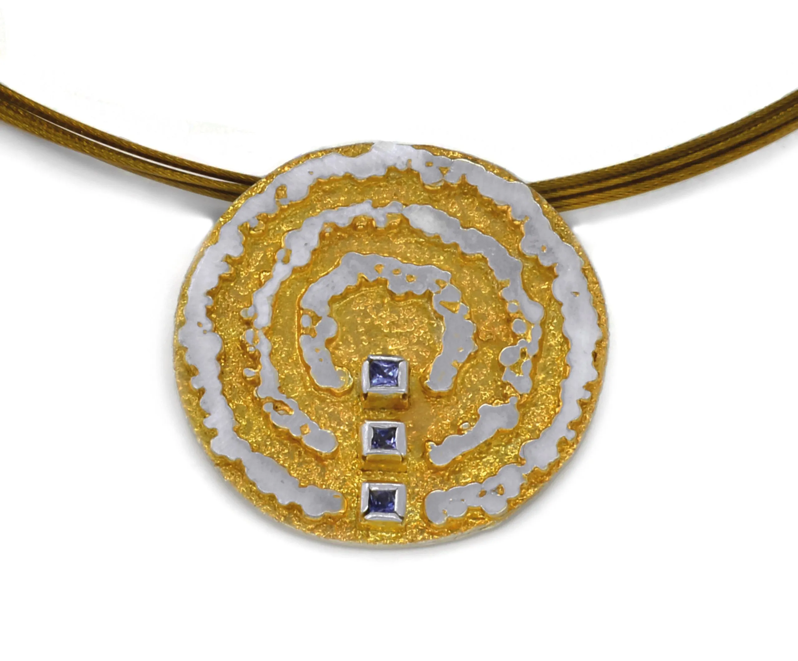 Ciondolo in argento e argento placcato oro con tanzanite e anello multifilare