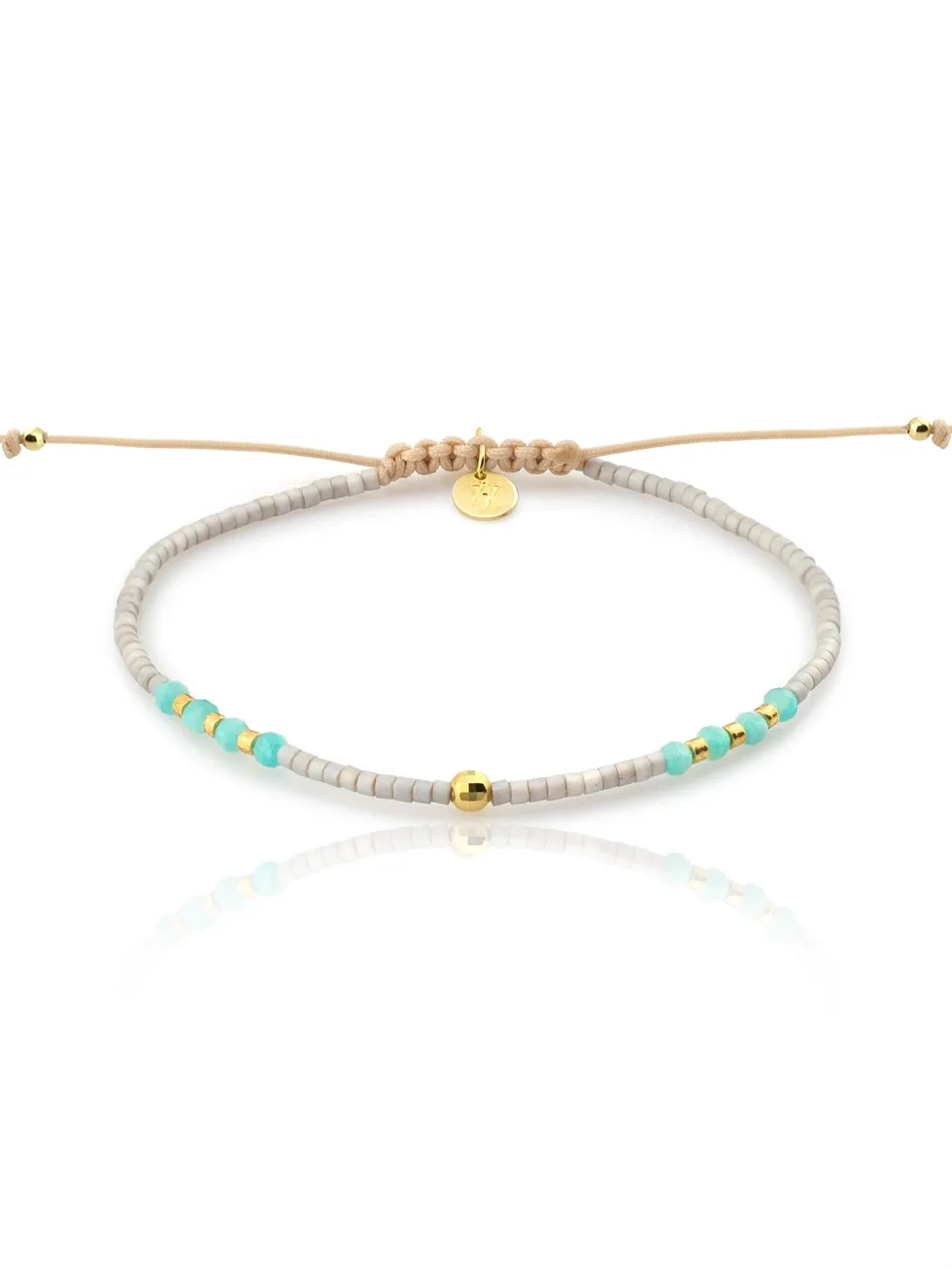 CAMPUS GLD. Pulsera hilo macramé, plata de ley, piedra azul, baño oro.